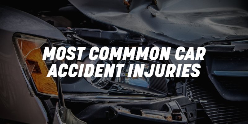 picture of a car crashed with the the label "common car accident injuries"